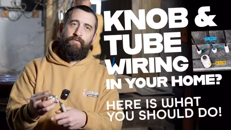 Loyal Lab Electric electrician holding knob and tube wiring Portsmouth NH