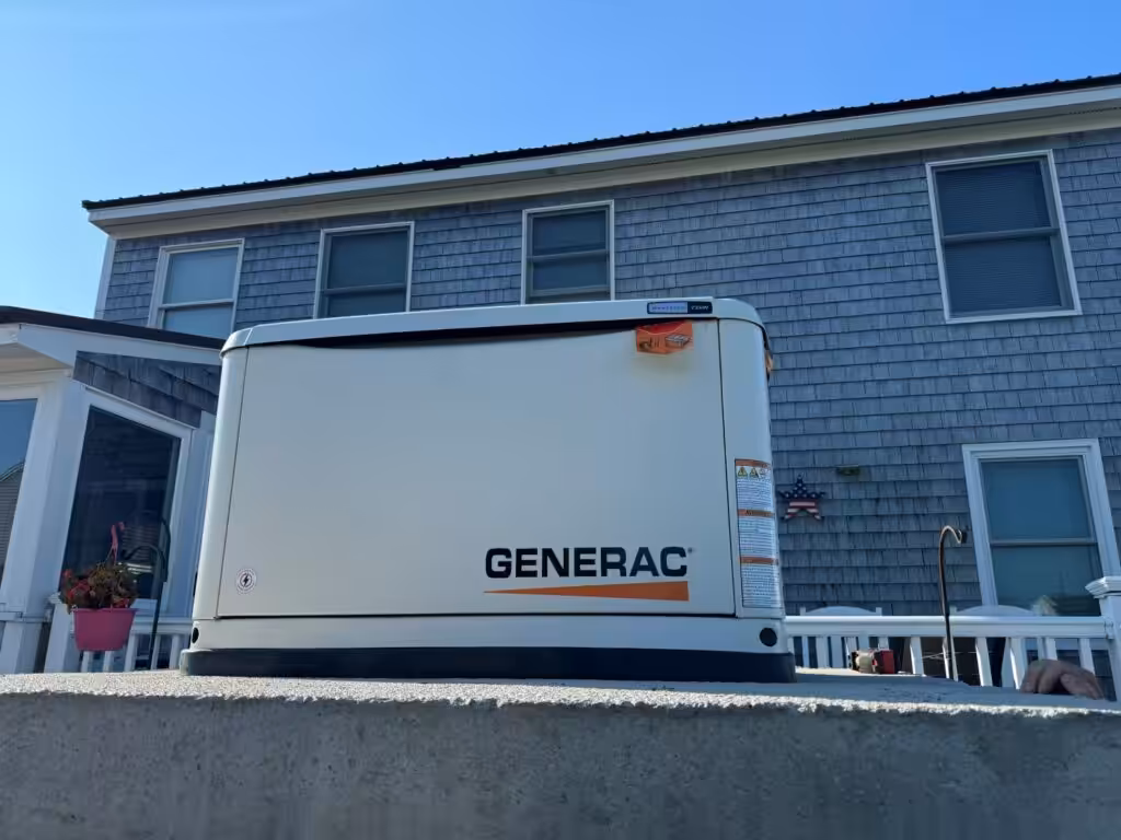 A generator installed in Rye nh by loyal lab installed on an oversized concrete slab to avoid flooding